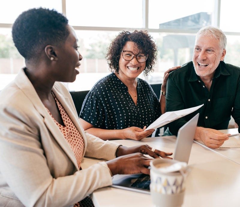 Middle aged couple meeting with a banker