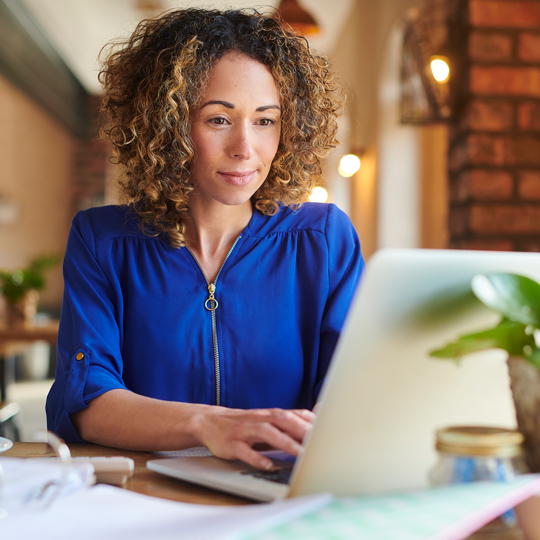 Woman working on a laptop